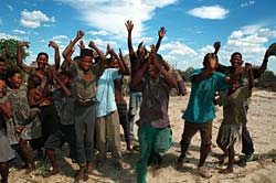 Bushmen inside the Central Kalahari Game Reserve erupt with joy on learning of their historic victory.